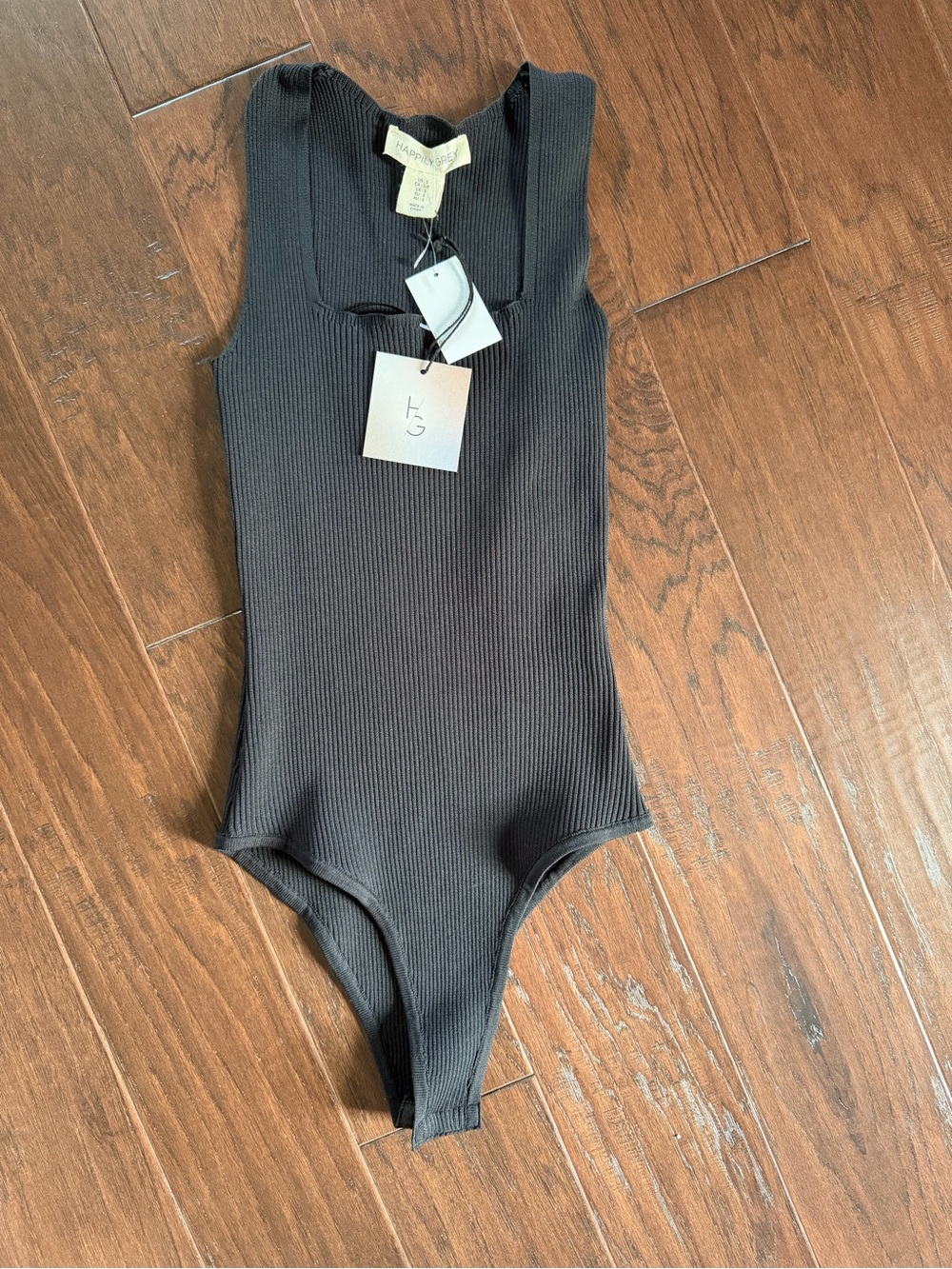 Ribbed Black Womens One-Piece Bodysuit by Happily Grey